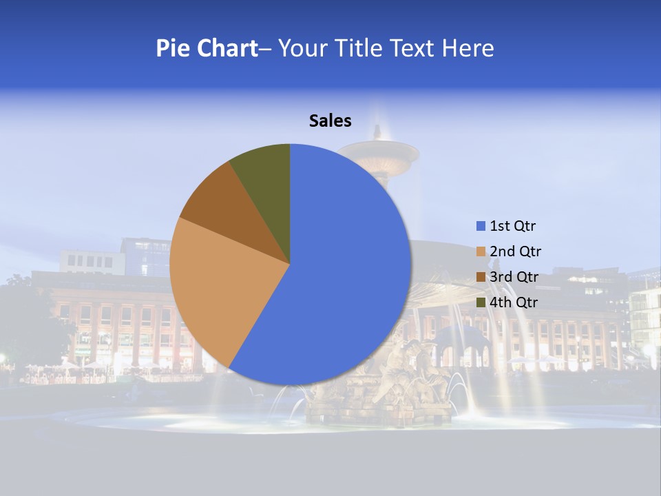 A Fountain In Front Of A Building At Night PowerPoint Template