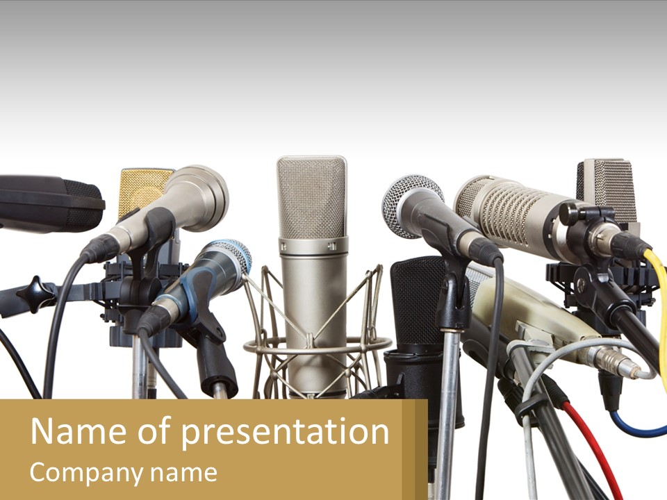 A Group Of Microphones Sitting Next To Each Other PowerPoint Template