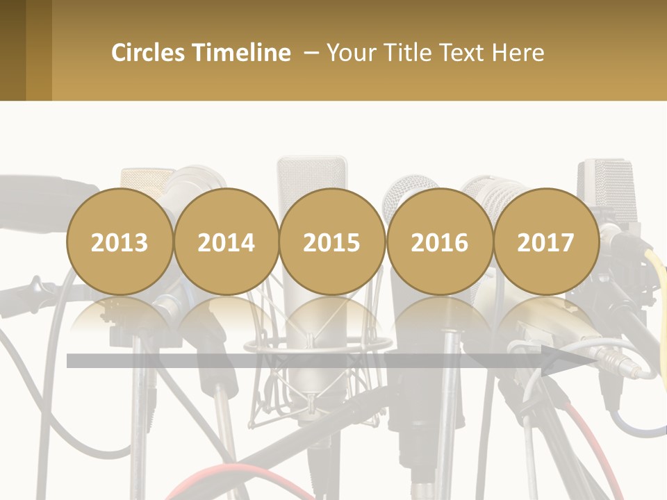 A Group Of Microphones Sitting Next To Each Other PowerPoint Template