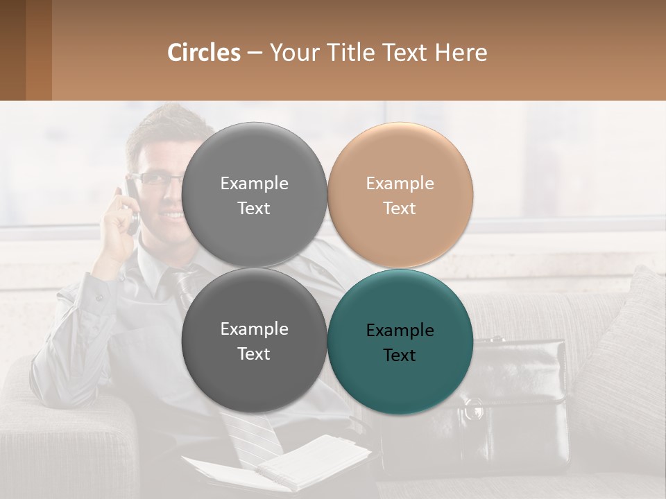 A Man Sitting On A Couch Talking On A Cell Phone PowerPoint Template