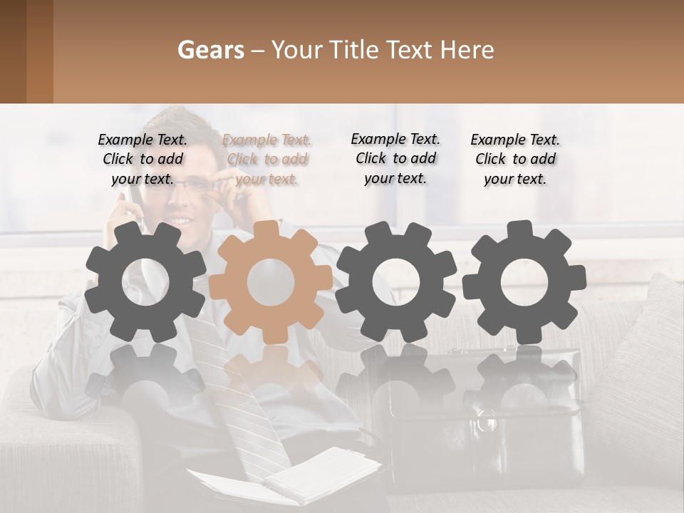 A Man Sitting On A Couch Talking On A Cell Phone PowerPoint Template