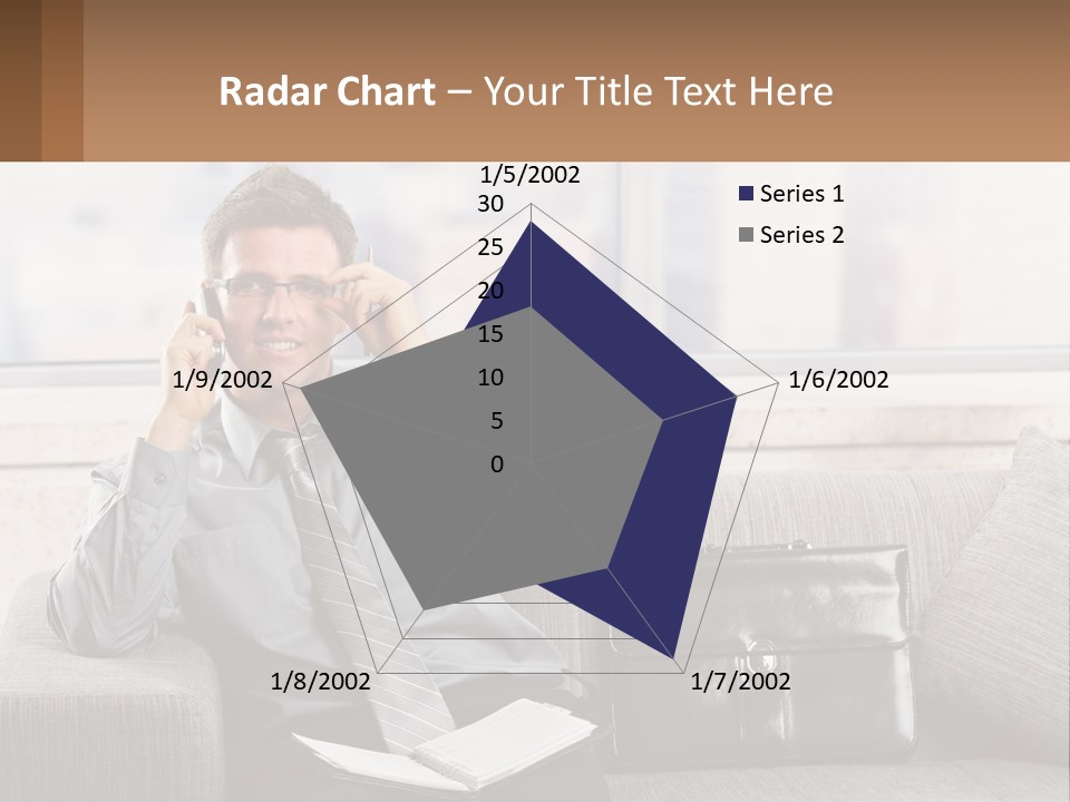 A Man Sitting On A Couch Talking On A Cell Phone PowerPoint Template