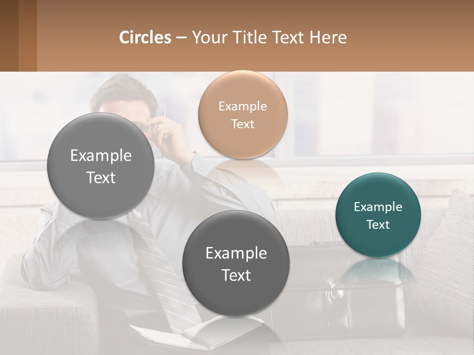 A Man Sitting On A Couch Talking On A Cell Phone PowerPoint Template