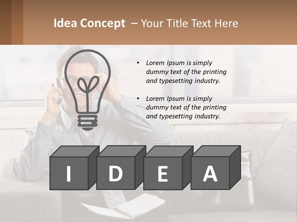 A Man Sitting On A Couch Talking On A Cell Phone PowerPoint Template