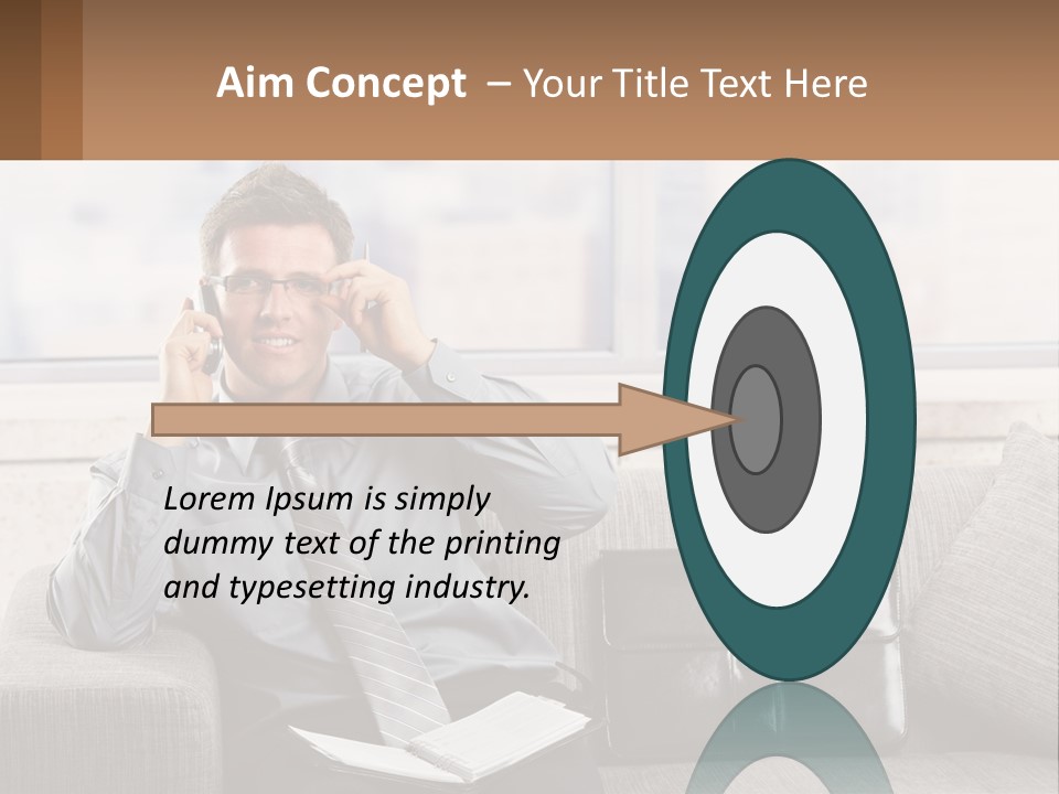A Man Sitting On A Couch Talking On A Cell Phone PowerPoint Template