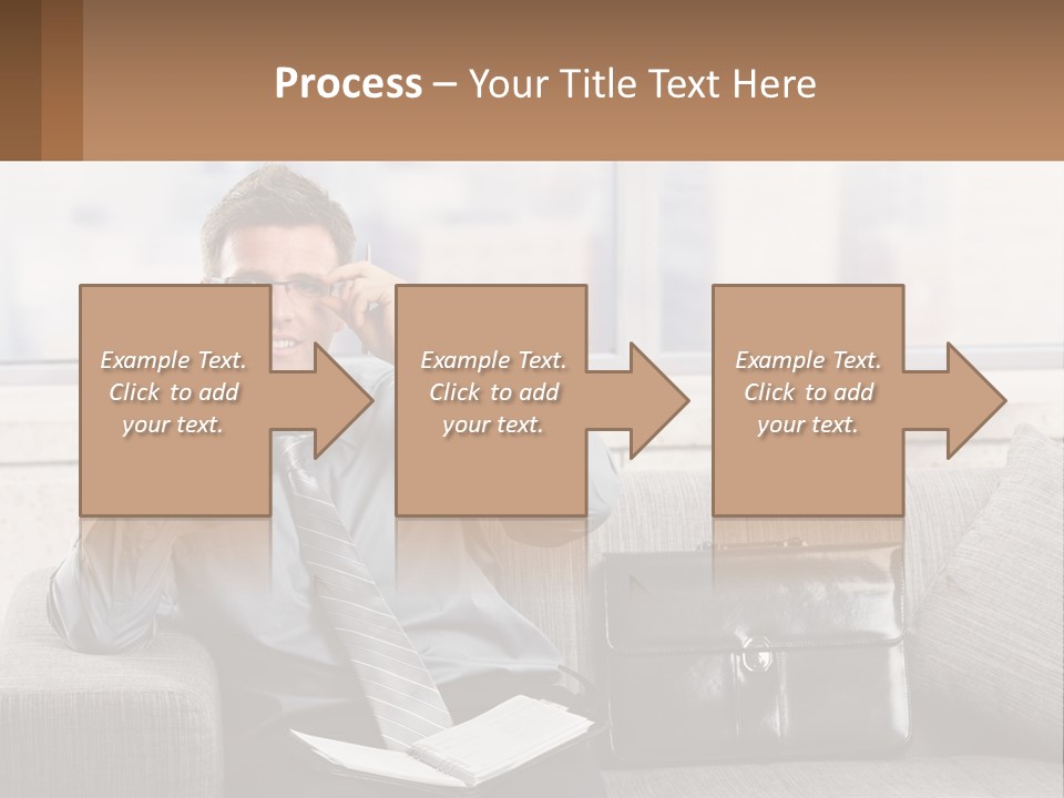 A Man Sitting On A Couch Talking On A Cell Phone PowerPoint Template