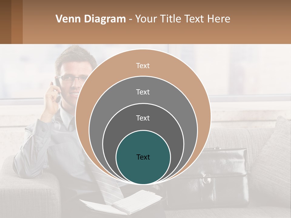 A Man Sitting On A Couch Talking On A Cell Phone PowerPoint Template