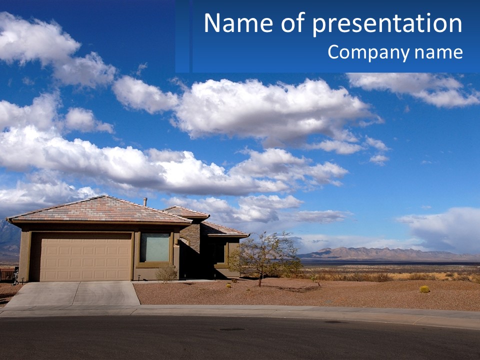 A House In The Middle Of A Desert With A Sky Background PowerPoint Template