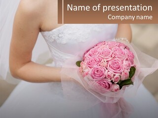A Woman In A Wedding Dress Holding A Bouquet Of Pink Roses PowerPoint Template