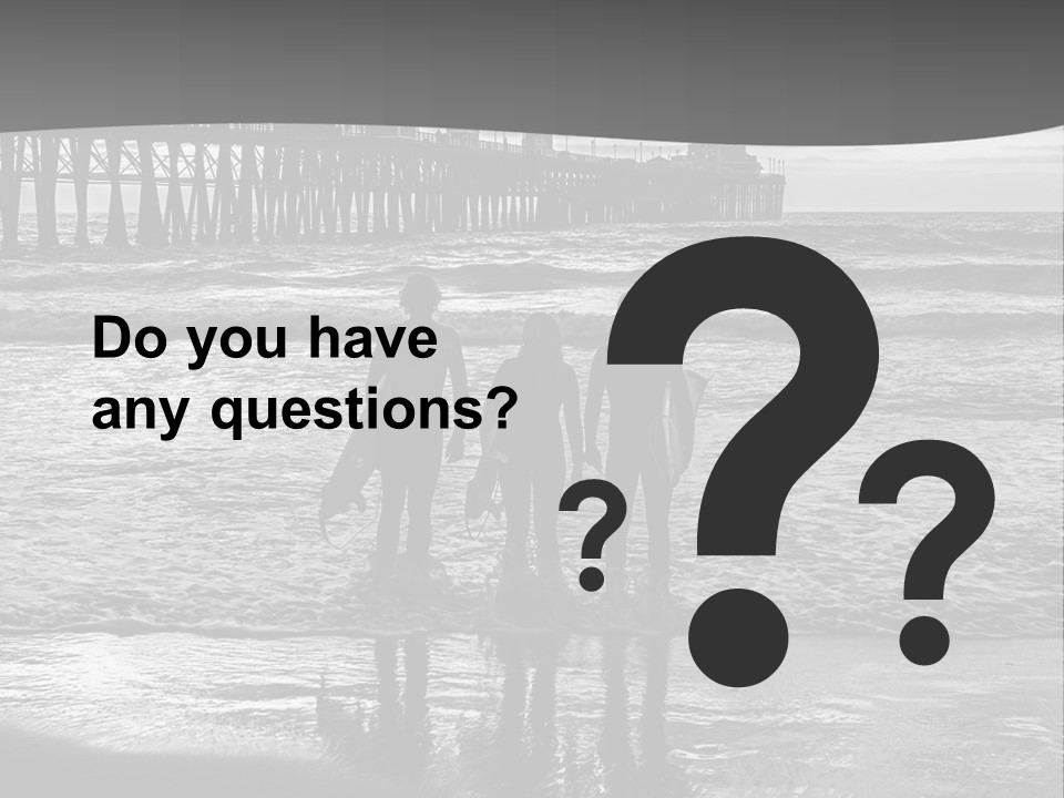 Three Surfers Standing On The Beach With A Pier In The Background PowerPoint Template