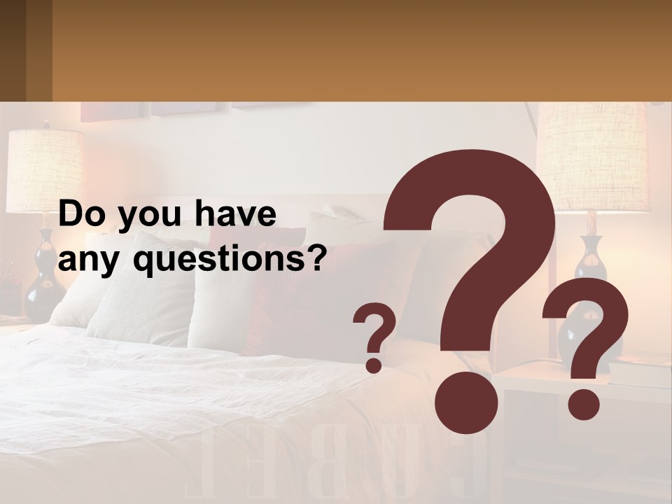A Bed With Pillows And Lamps In A Bedroom PowerPoint Template