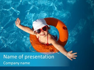 A Little Girl In A Swimming Pool With A Life Preserver PowerPoint Template