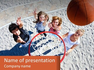 A Group Of People Playing Basketball In The Sand PowerPoint Template