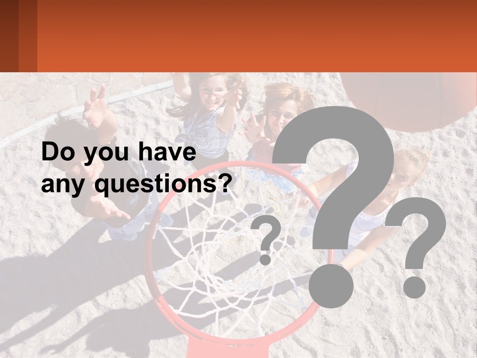 A Group Of People Playing Basketball In The Sand PowerPoint Template