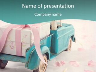 A Blue Toy Truck With A Pink Ribbon On It PowerPoint Template