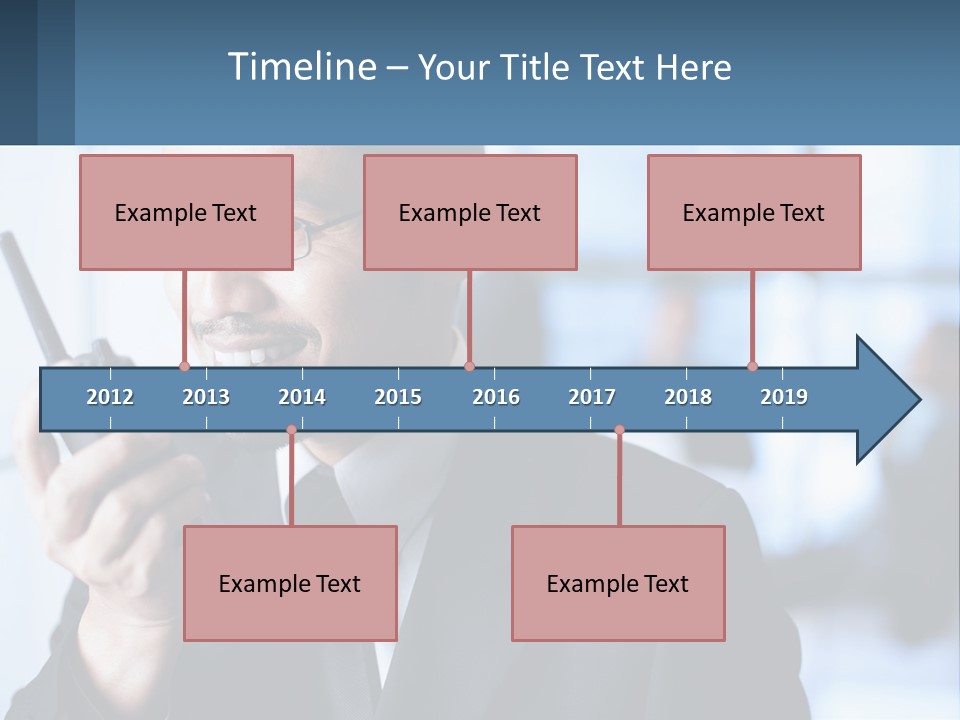 A Man In A Suit Holding A Cell Phone PowerPoint Template