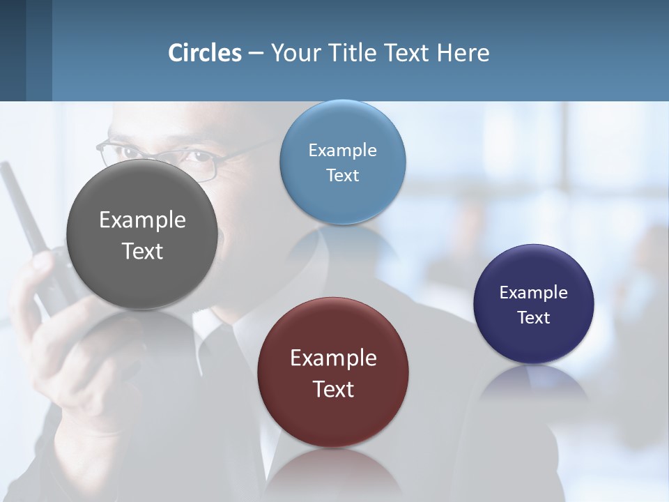 A Man In A Suit Holding A Cell Phone PowerPoint Template