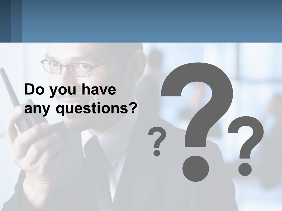 A Man In A Suit Holding A Cell Phone PowerPoint Template