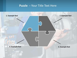 A Man Working On A Machine In A Factory PowerPoint Template