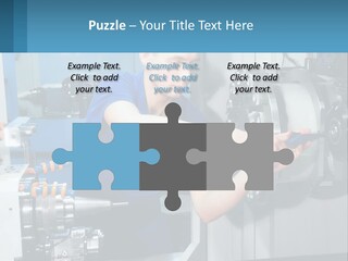 A Man Working On A Machine In A Factory PowerPoint Template