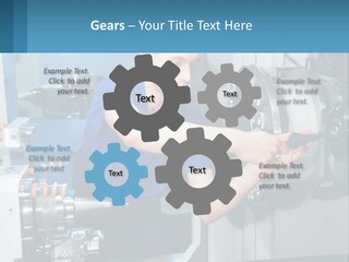 A Man Working On A Machine In A Factory PowerPoint Template