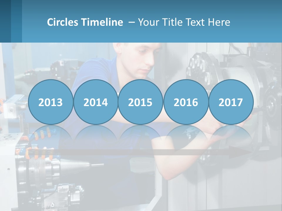 A Man Working On A Machine In A Factory PowerPoint Template