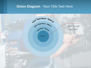 A Man Working On A Machine In A Factory PowerPoint Template