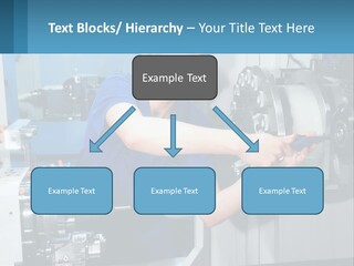 A Man Working On A Machine In A Factory PowerPoint Template