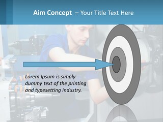 A Man Working On A Machine In A Factory PowerPoint Template