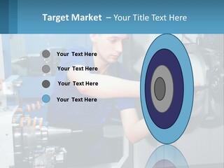 A Man Working On A Machine In A Factory PowerPoint Template