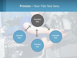 A Man Working On A Machine In A Factory PowerPoint Template