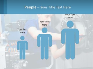 A Man Working On A Machine In A Factory PowerPoint Template