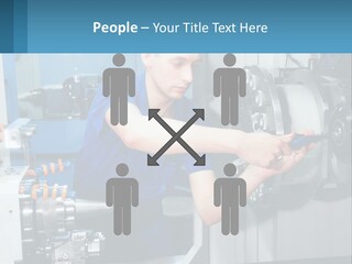 A Man Working On A Machine In A Factory PowerPoint Template