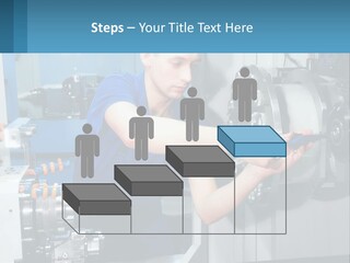 A Man Working On A Machine In A Factory PowerPoint Template