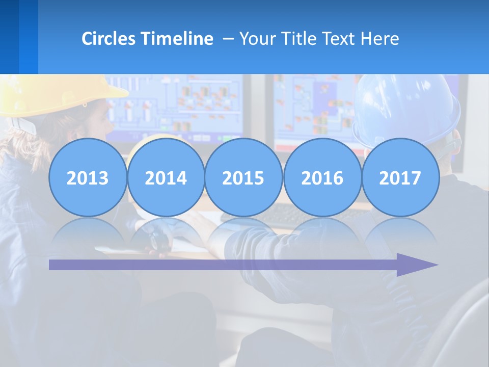 A Man In A Hard Hat Is Working On A Computer PowerPoint Template