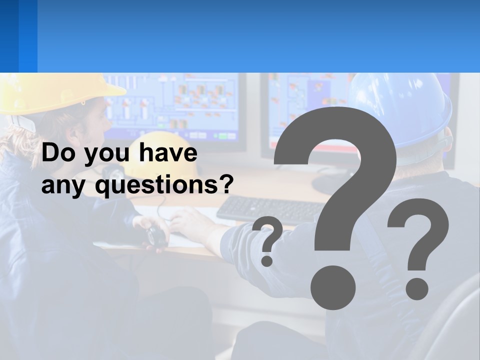 A Man In A Hard Hat Is Working On A Computer PowerPoint Template