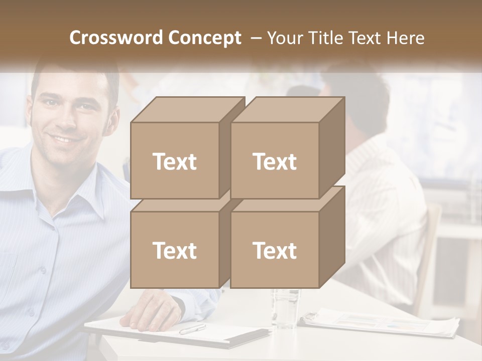 A Man Sitting At A Desk In Front Of A Group Of People PowerPoint Template