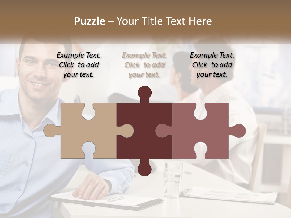 A Man Sitting At A Desk In Front Of A Group Of People PowerPoint Template