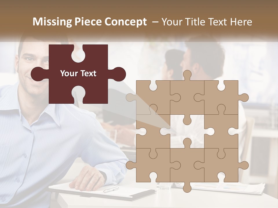 A Man Sitting At A Desk In Front Of A Group Of People PowerPoint Template