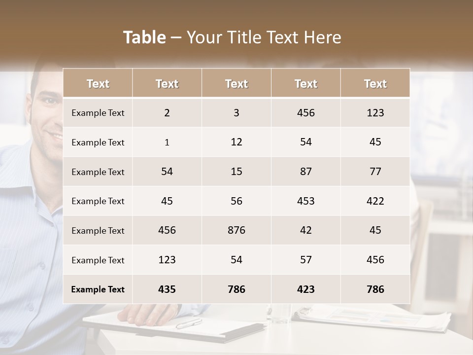 A Man Sitting At A Desk In Front Of A Group Of People PowerPoint Template