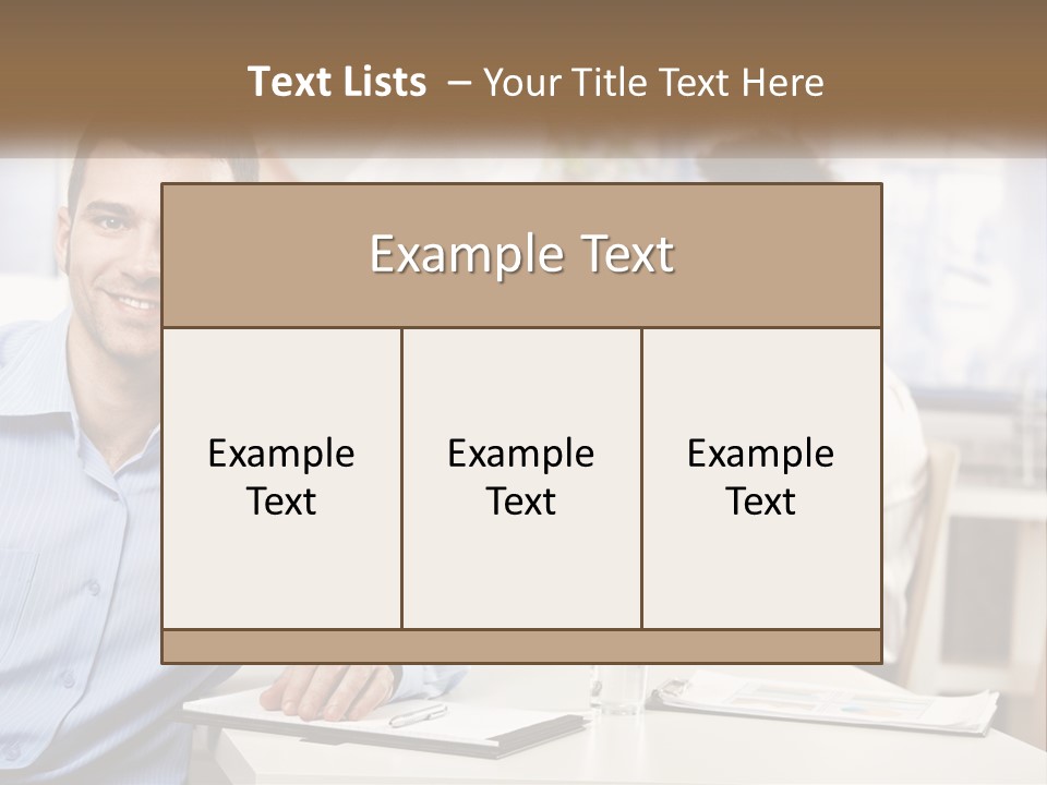 A Man Sitting At A Desk In Front Of A Group Of People PowerPoint Template