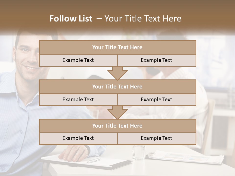 A Man Sitting At A Desk In Front Of A Group Of People PowerPoint Template