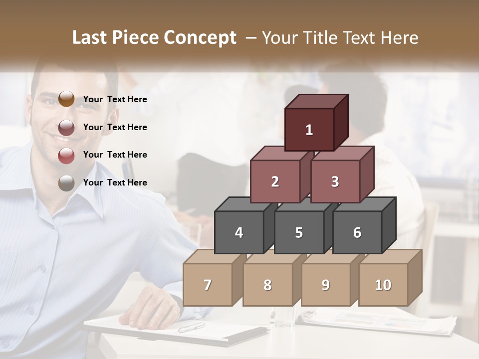 A Man Sitting At A Desk In Front Of A Group Of People PowerPoint Template