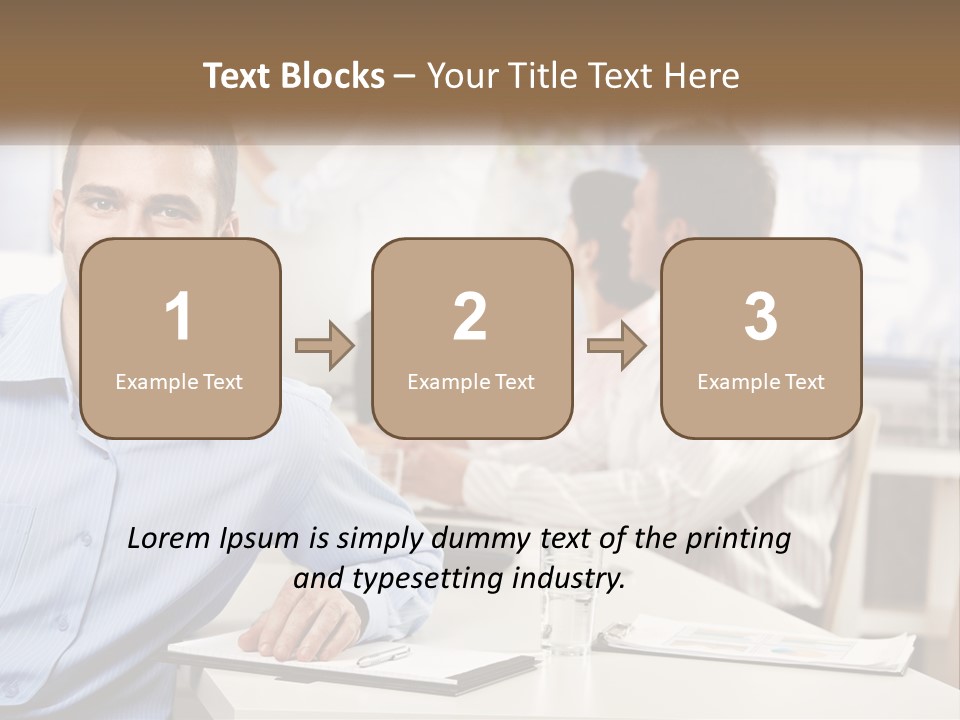 A Man Sitting At A Desk In Front Of A Group Of People PowerPoint Template
