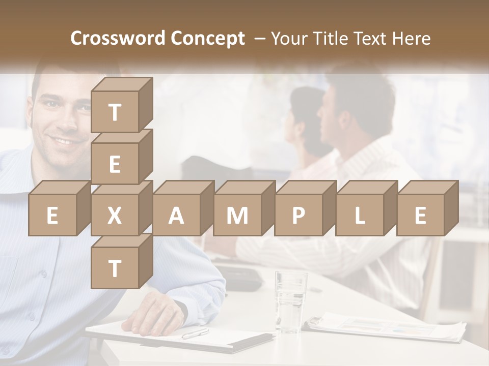 A Man Sitting At A Desk In Front Of A Group Of People PowerPoint Template