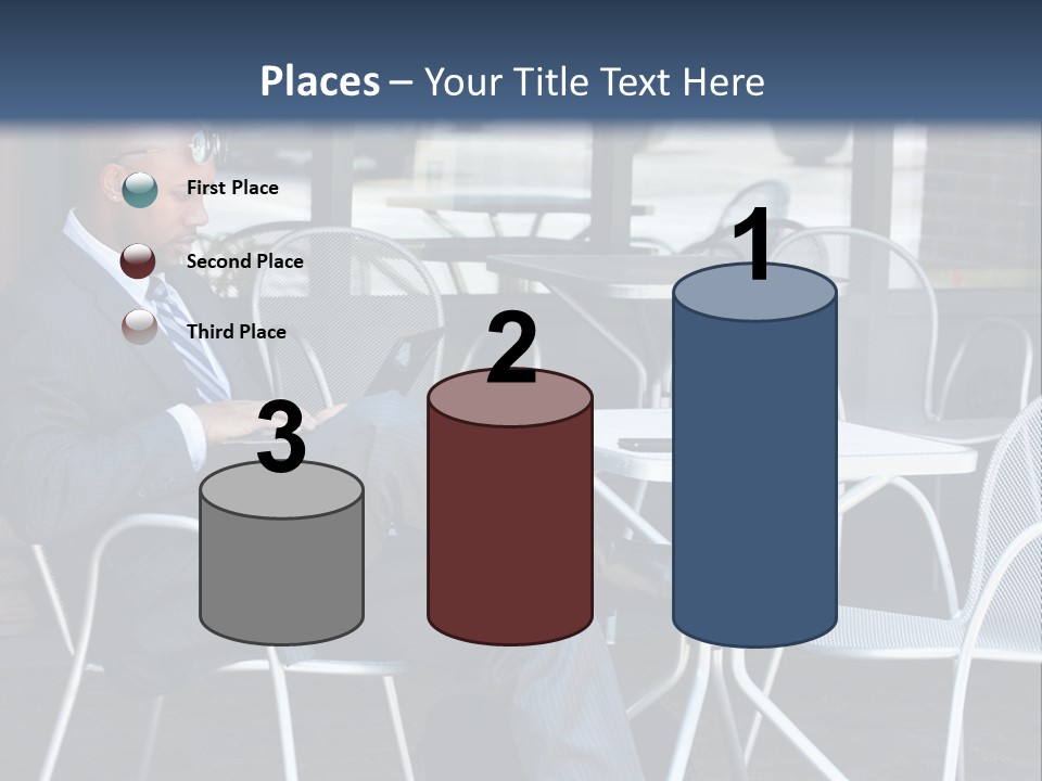 A Man In A Suit Sitting At A Table With A Laptop PowerPoint Template