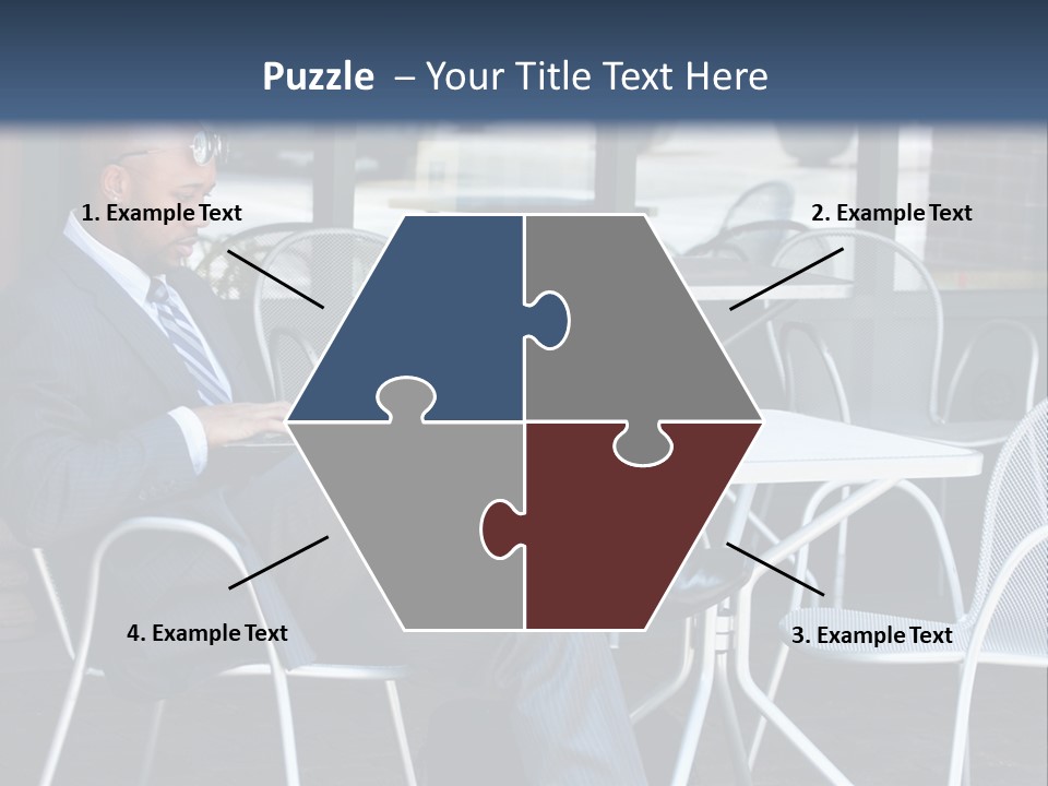 A Man In A Suit Sitting At A Table With A Laptop PowerPoint Template