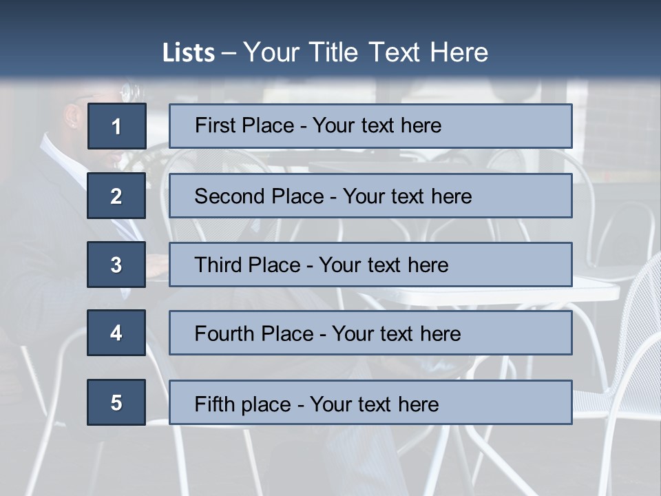 A Man In A Suit Sitting At A Table With A Laptop PowerPoint Template