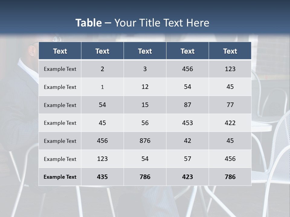 A Man In A Suit Sitting At A Table With A Laptop PowerPoint Template