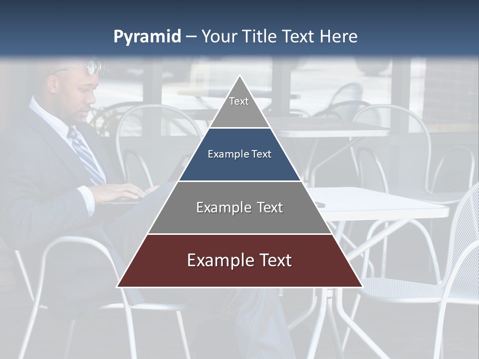 A Man In A Suit Sitting At A Table With A Laptop PowerPoint Template